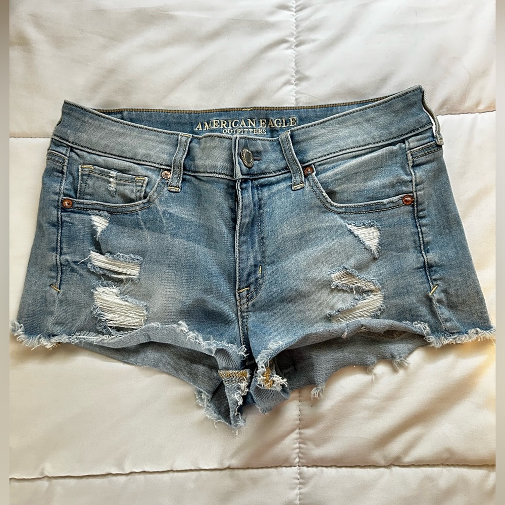 American Eagle Distressed Denim Next Level  Stretch X Shortie Shorts light blue